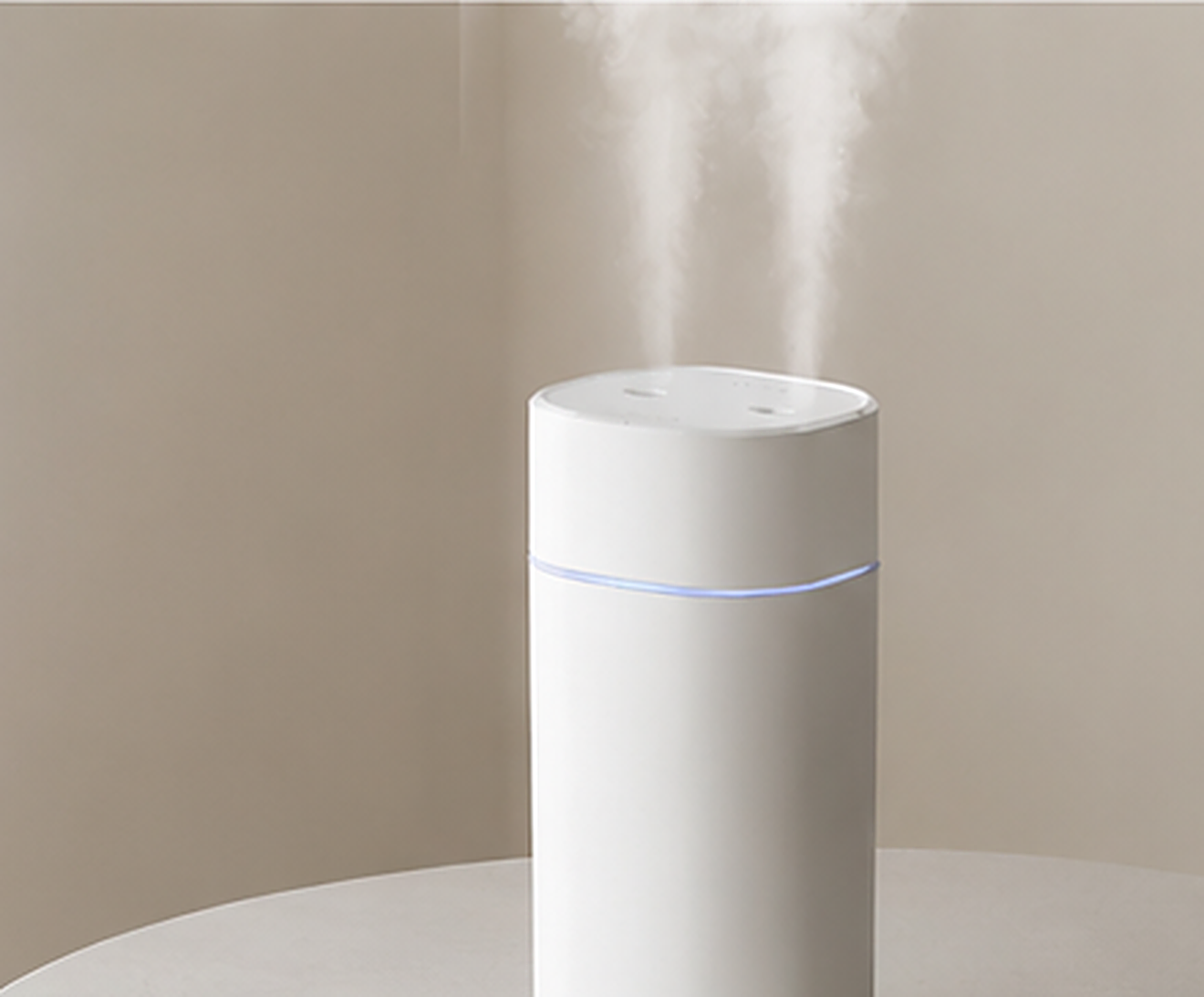 The white Amalvi humidifier running on a table in daylight.